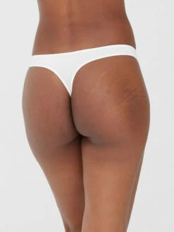 Skarlett Blue Entice Thong 5 Skarlett Blue Entice Thong -CA Swimsuit Sales Shop 371143EnticeLaceThongNylonWhiteBackEdited